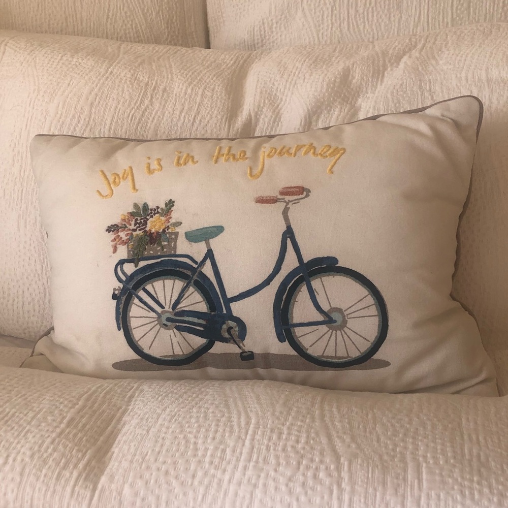Decorative embroidered pillow with bike